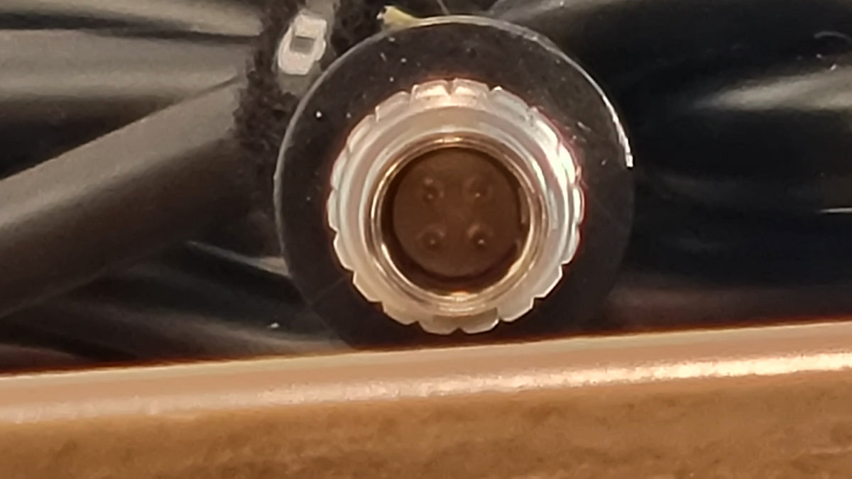 Close up of 4-Pin LEMO Male Connector -Male 2-Pin D-Tap to Male4-Pin LEMO Power Cable Assembly 96 inches long from The LA Firm